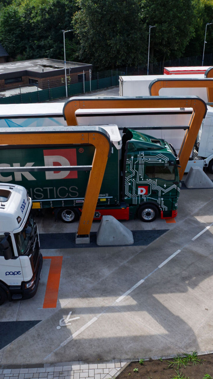 Trucks lined up at the fast-charging station
